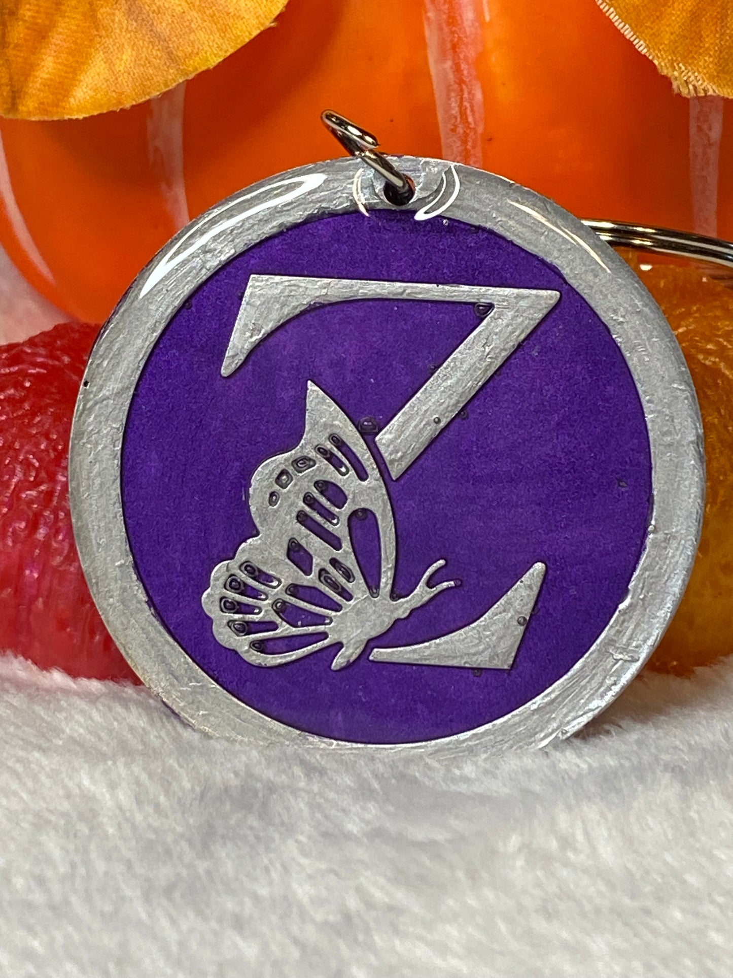 Round Purple with Silver Letters & Symbols Keychains