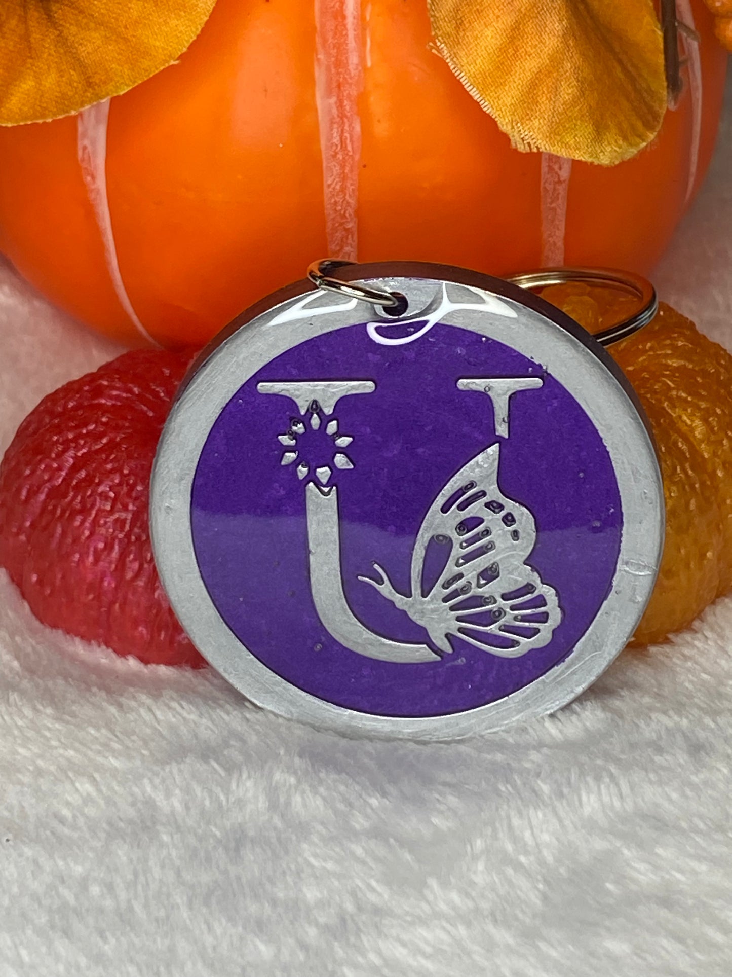 Round Purple with Silver Letters & Symbols Keychains