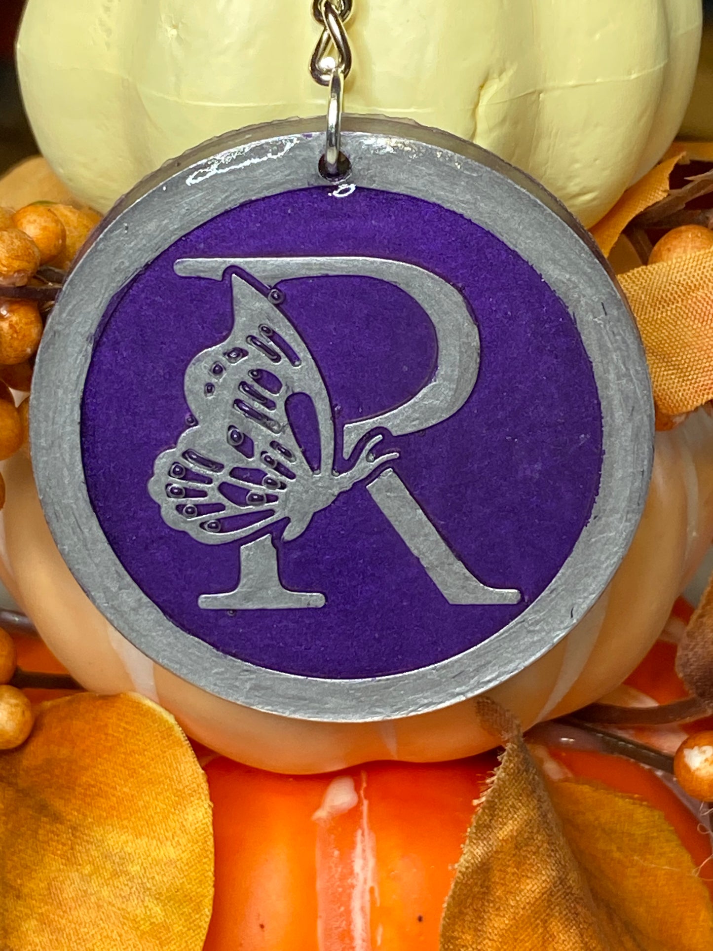 Round Purple with Silver Letters & Symbols Keychains