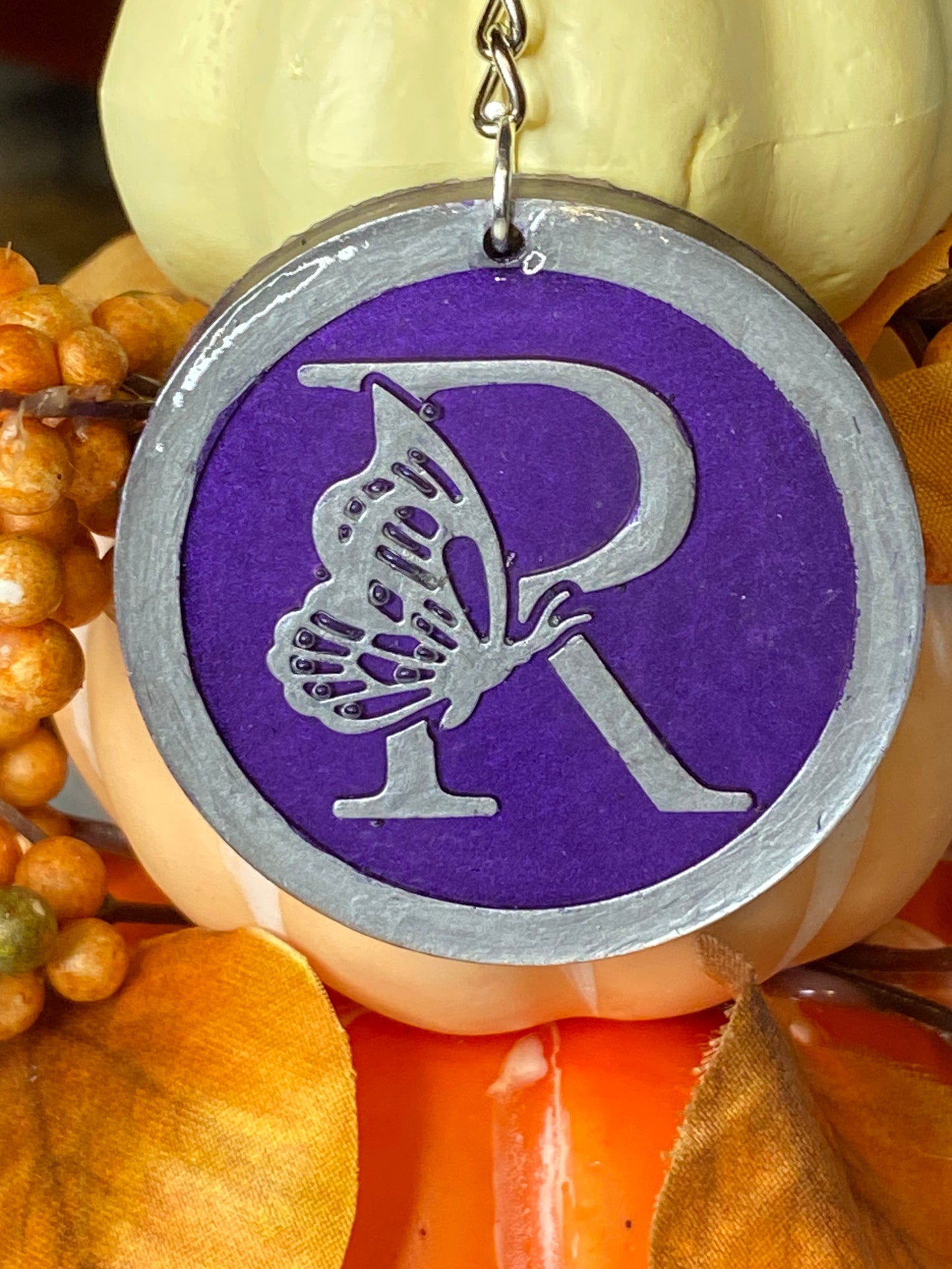 Round Purple with Silver Letters & Symbols Keychains