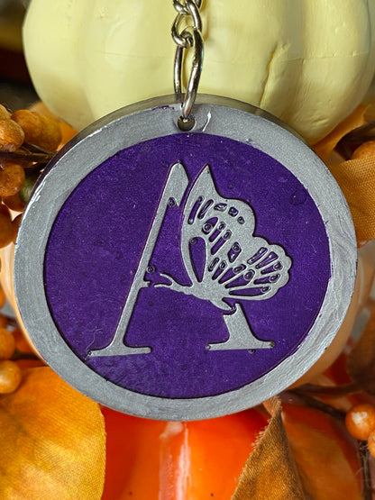 Round Purple with Silver Letters & Symbols Keychains