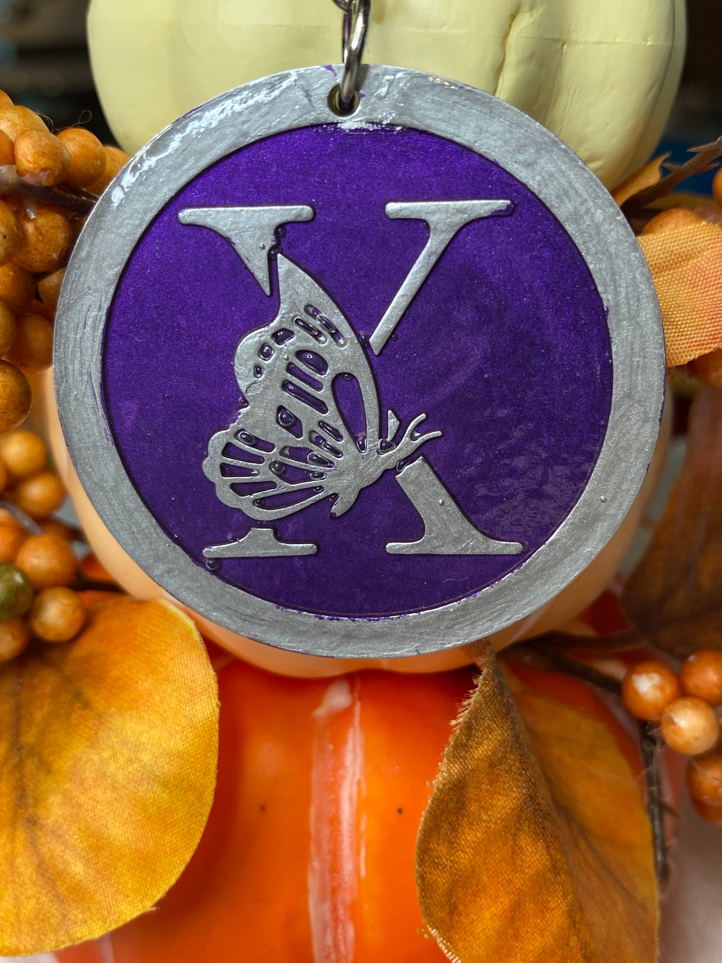 Round Purple with Silver Letters & Symbols Keychains