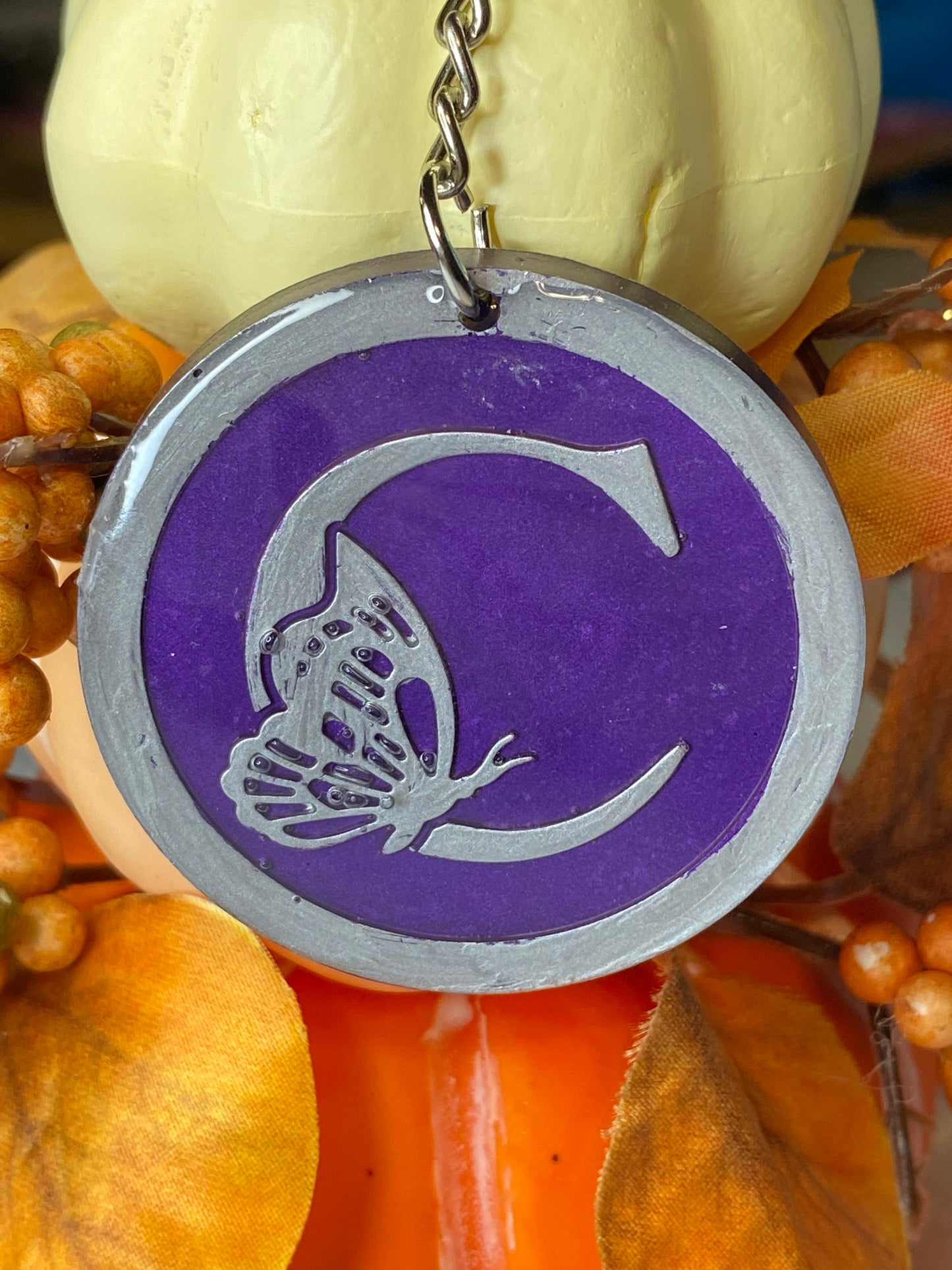 Round Purple with Silver Letters & Symbols Keychains